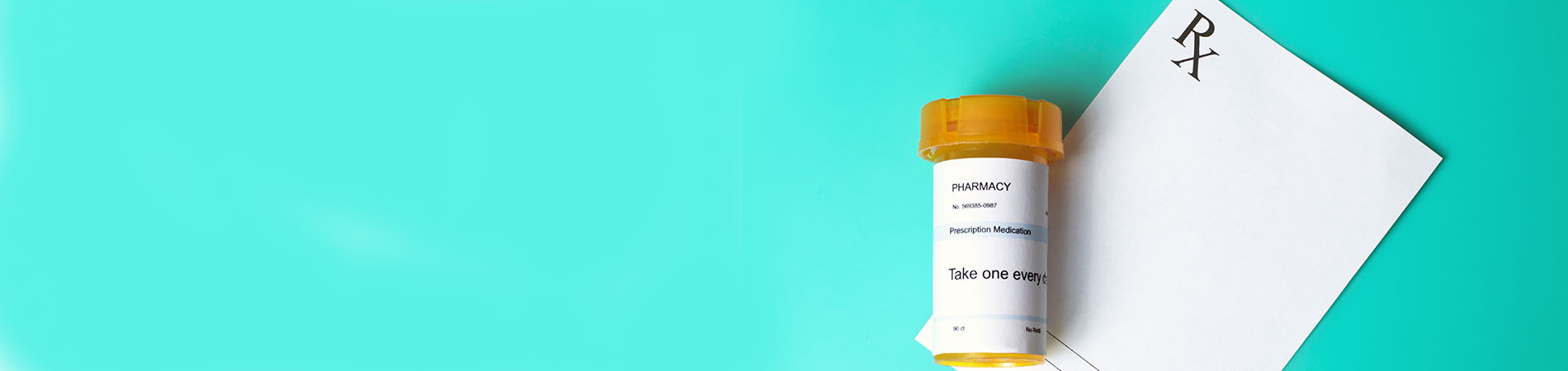medicine bottle on a prescription pad that typically includes a DEA number for the provider
