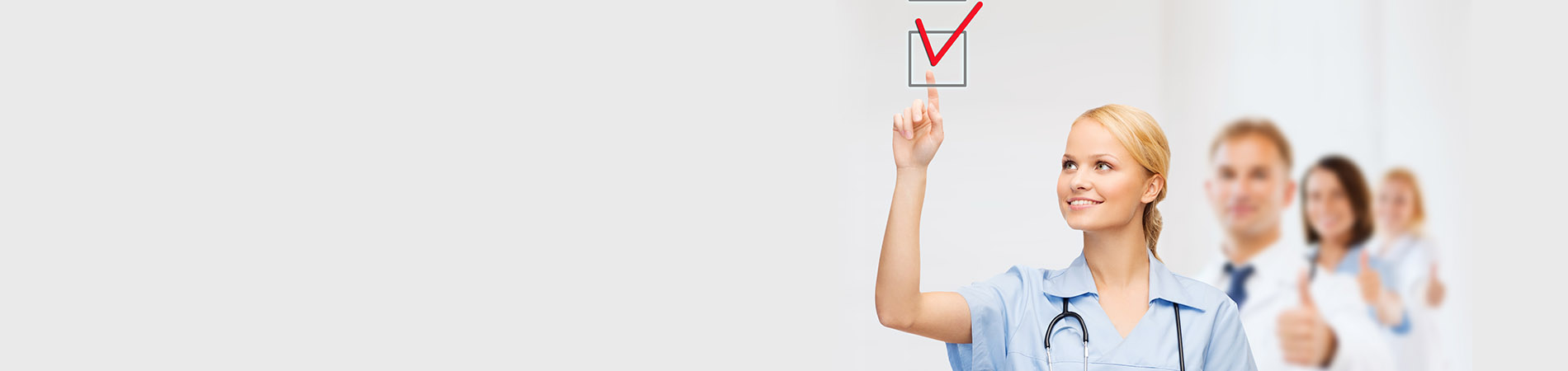 Nurse checking off a mark on an EHR implementation checklist