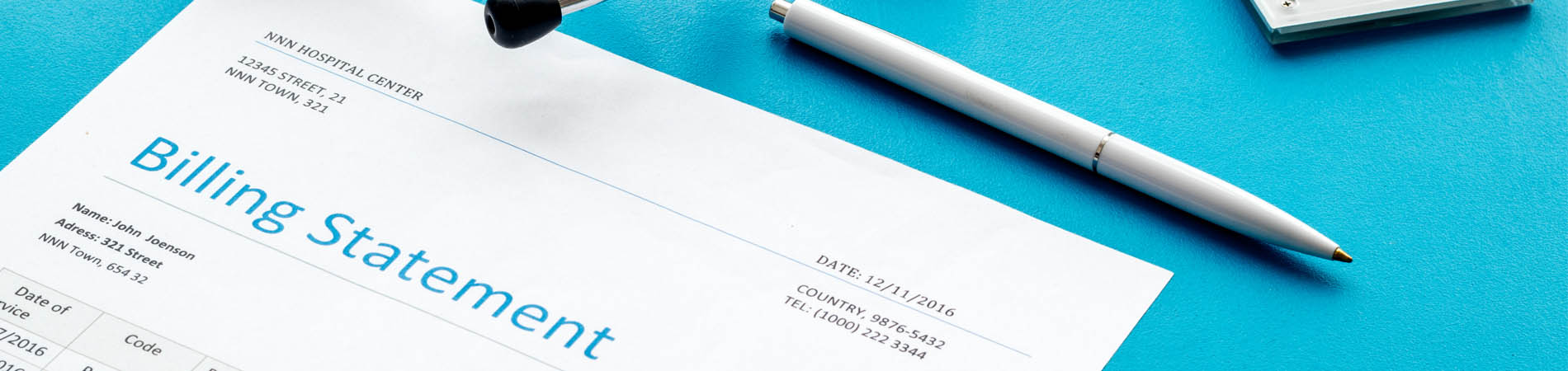 Price Transparency in Healthcare: a billing statement laid out with a pen, calculator, and other medical gear.