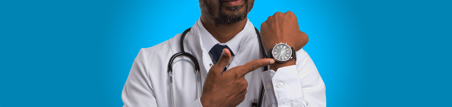 doctor pointing at watch